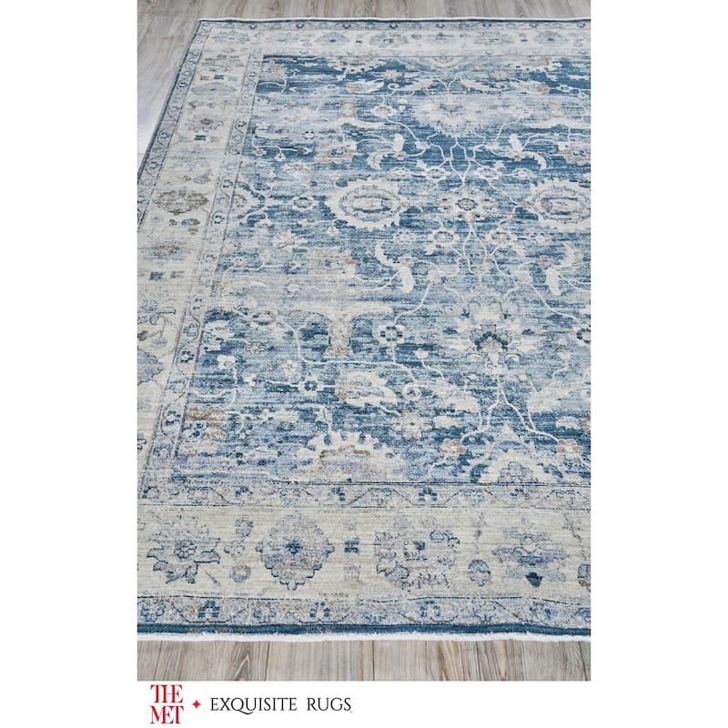 The Met X Exquisite Rugs Vintage Looms Blue/Beige Area Rug.