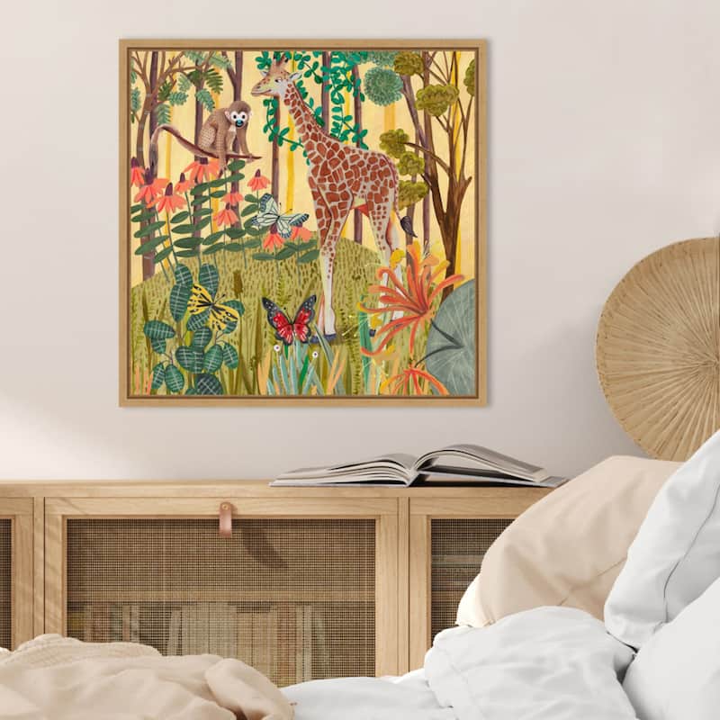 Giraffe in nature by Caroline Bonne Muller Framed Canvas Wall Art