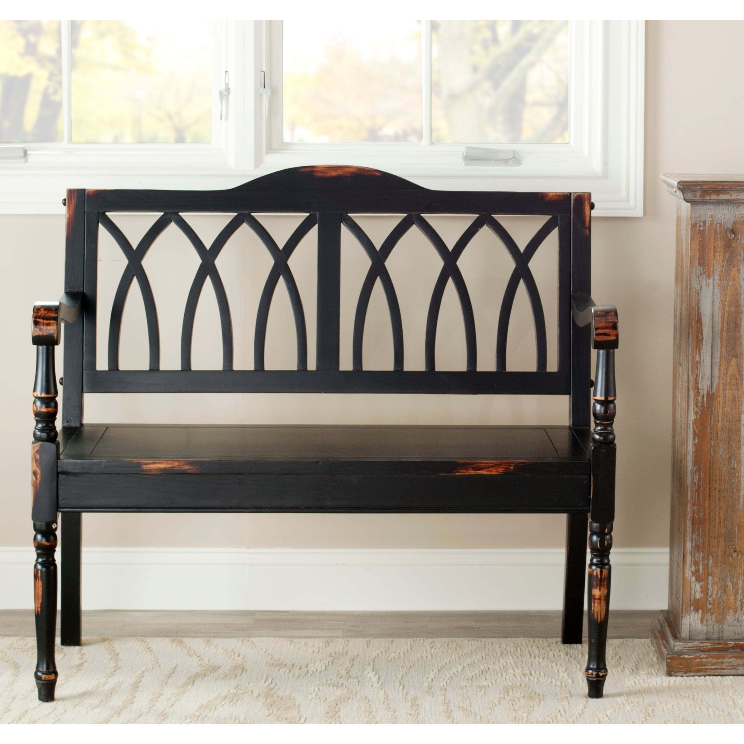 https://ak1.ostkcdn.com/images/products/is/images/direct/445e6f0a5eb0538b71521cc937119e2205528437/SAFAVIEH-Carlise-Distressed-Black-Bench.jpg