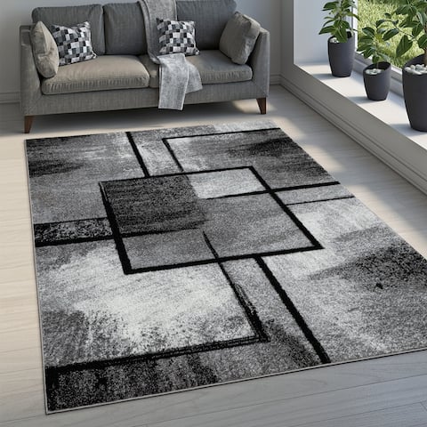 Black White Area Rug with Geometric Pattern and Modern Paint Effect