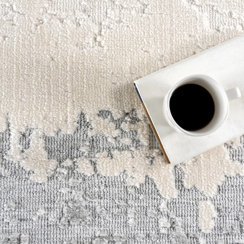 Mera Bordered Wool Area Rug