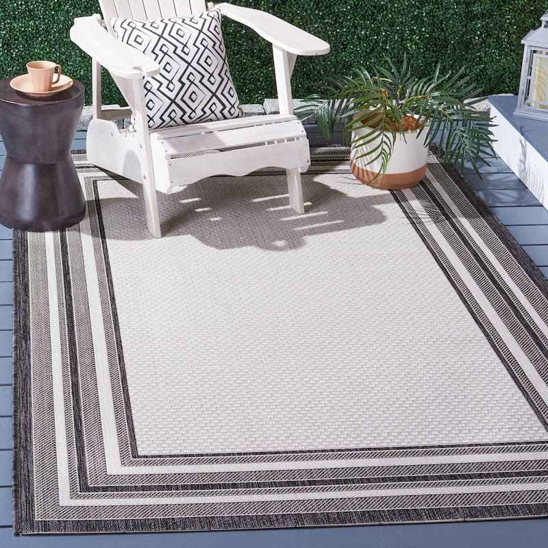 SAFAVIEH Courtyard Vickie Indoor/ Outdoor Waterproof Patio Backyard Rug - 9' x 12' - Ivory/Black