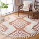 SAFAVIEH Moroccan Tassel Shag Iulieana Boho Tribal 2-inch Thick Rug - 6' Round - Orange/Ivory
