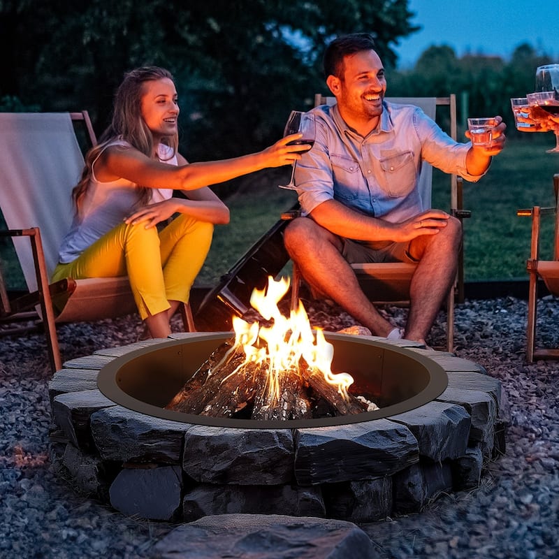 Black Carbon Steel Round Ring Fire Pit Perfect for Outdoor Special Events or Holiday Gatherings