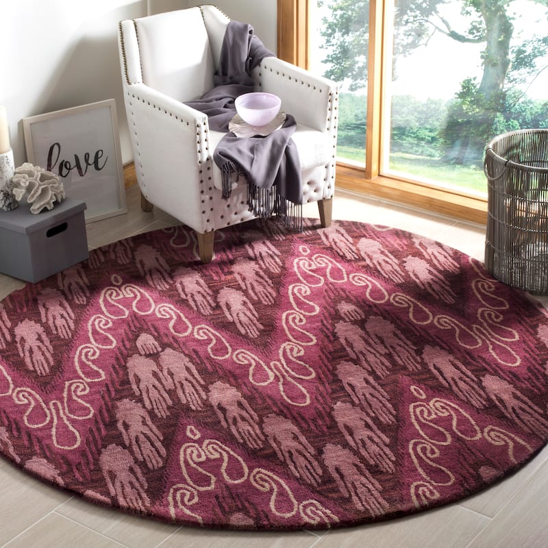 SAFAVIEH Handmade Ikat Domna Modern Wool Rug - 6' Round - Dark Brown/Purple