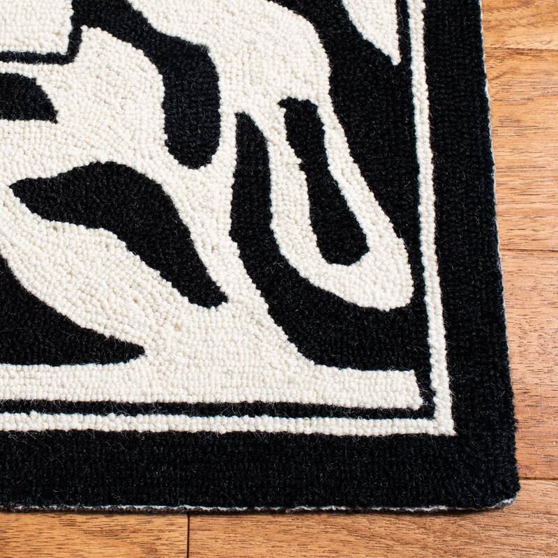 SAFAVIEH Handmade Chelsea Corky French Country Wool Rug