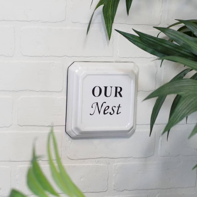 Our Nest Enameled Metal Wall Plaque Black and White
