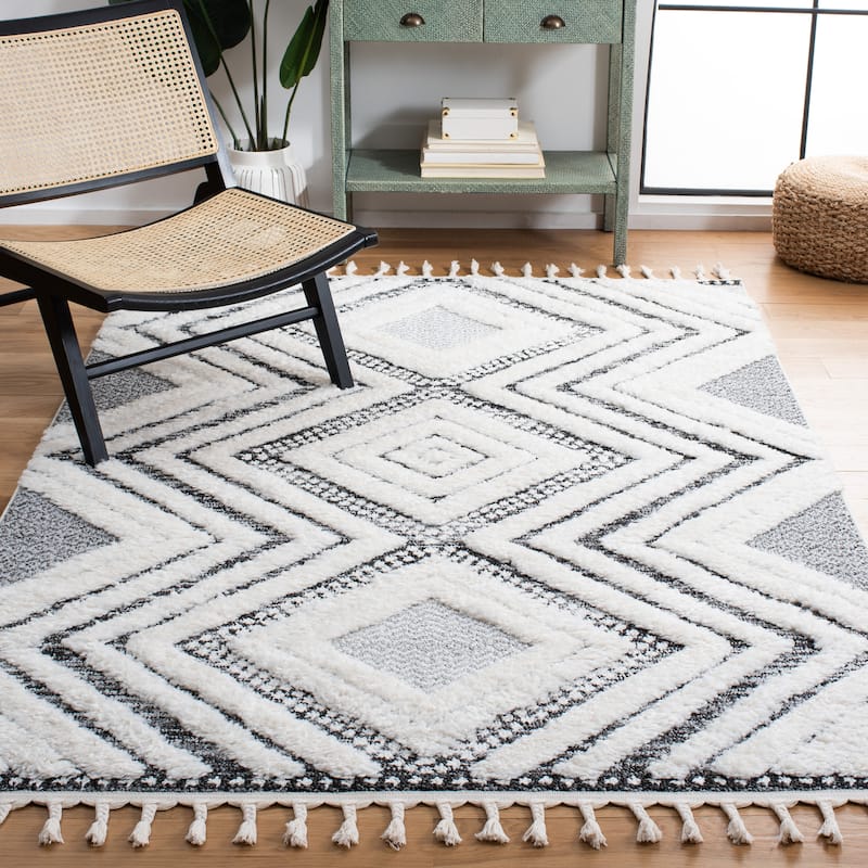 SAFAVIEH Moroccan Tassel Shag Selvije 2-inch Thick Rug - 9' x 12' - Ivory/Grey