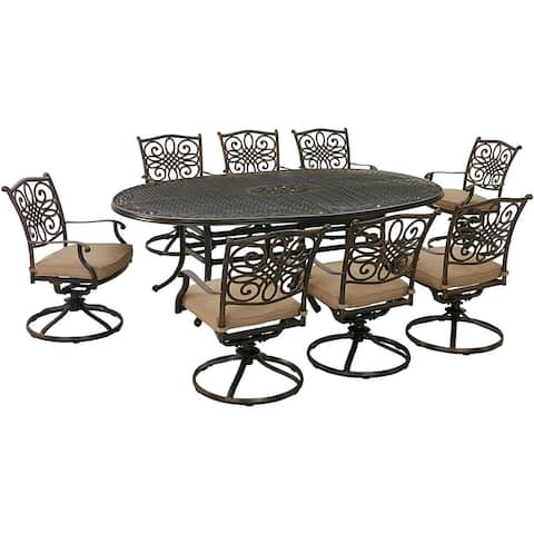 Hanover Traditions 9-Piece Dining Set in Tan with 8 Swivel Rockers and 95-in. x 60-in. Oval Cast-Top Dining Table