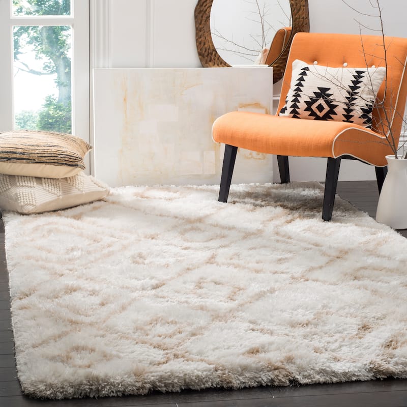 SAFAVIEH Handmade Toronto Shag Delaney Polyester Rug - 8' x 10' - Ivory/Beige