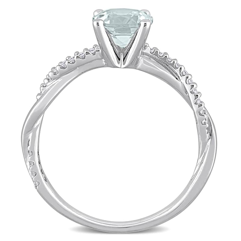 Miadora Aquamarine and 1/6ct TDW Diamond Crossover Birthstone Ring in 14k White Gold