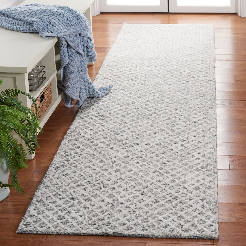 SAFAVIEH, Handmade Ebony Juozapa Modern Wool Rug