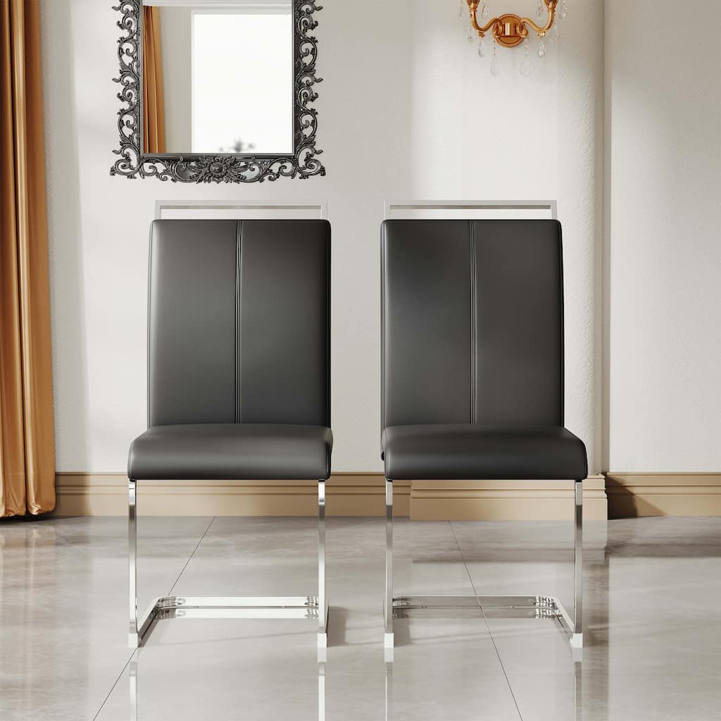 A set of 4 artificial leather dining chairs