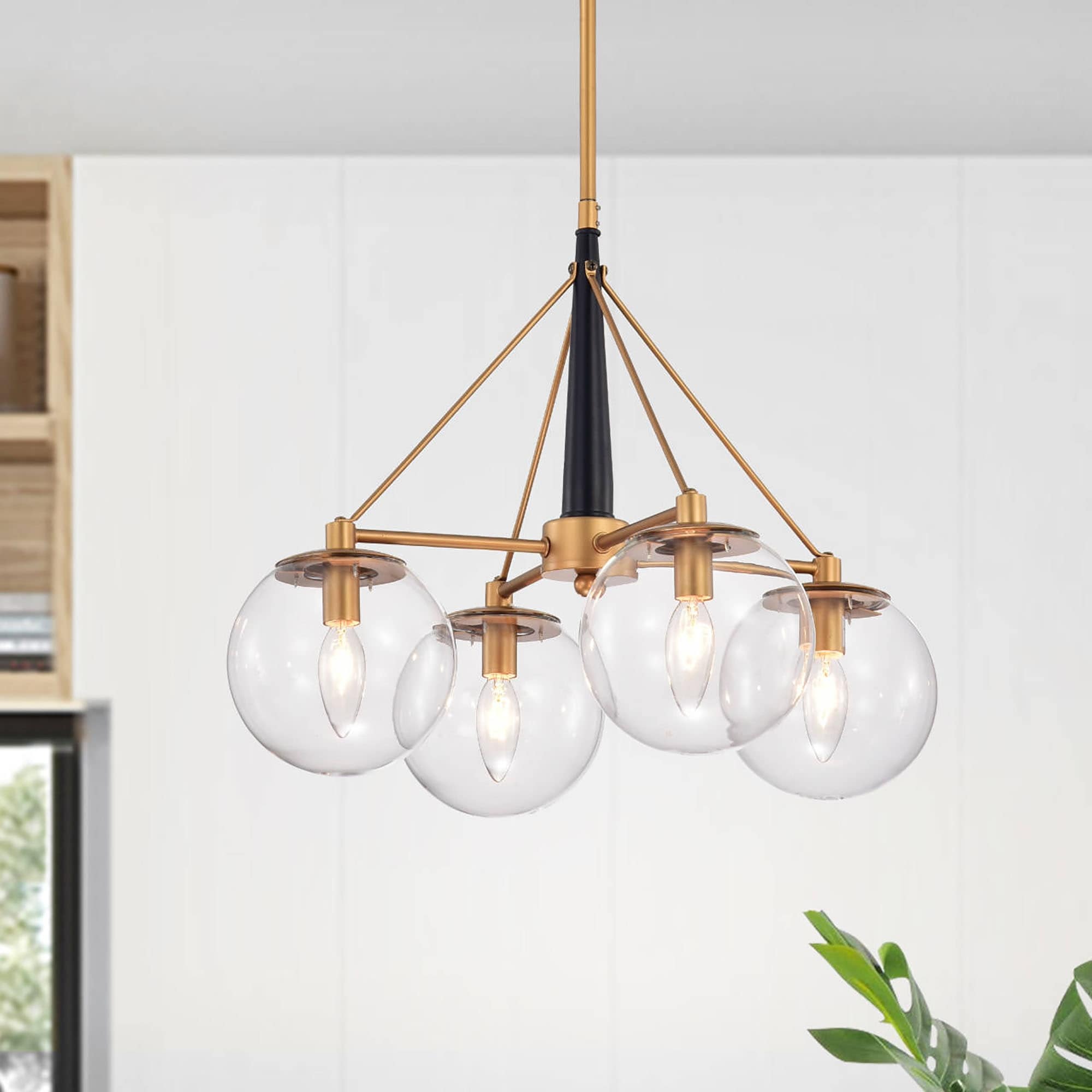 Warehouse of Tiffany Black and Gold 4-Light Chandelier with Clear Glass Globe Shades