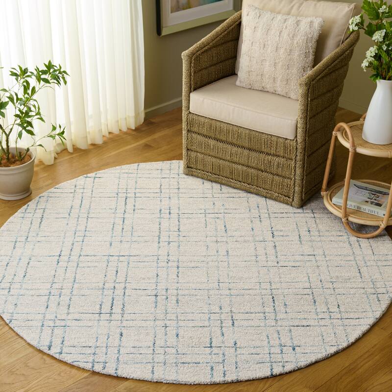 SAFAVIEH Handmade Genre Eilon Wool Rug - 6' Round - Ivory/Grey