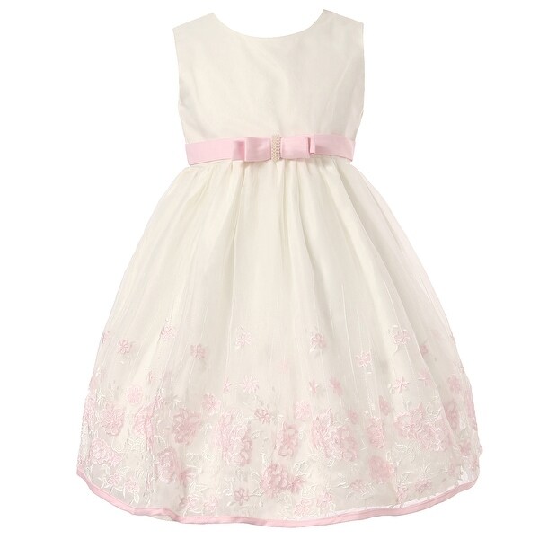 white dress with embroidered flowers