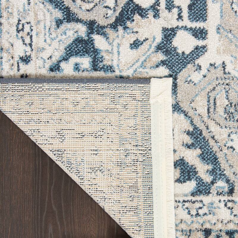 Nourison Geneva Traditional Bordered Area Rug.