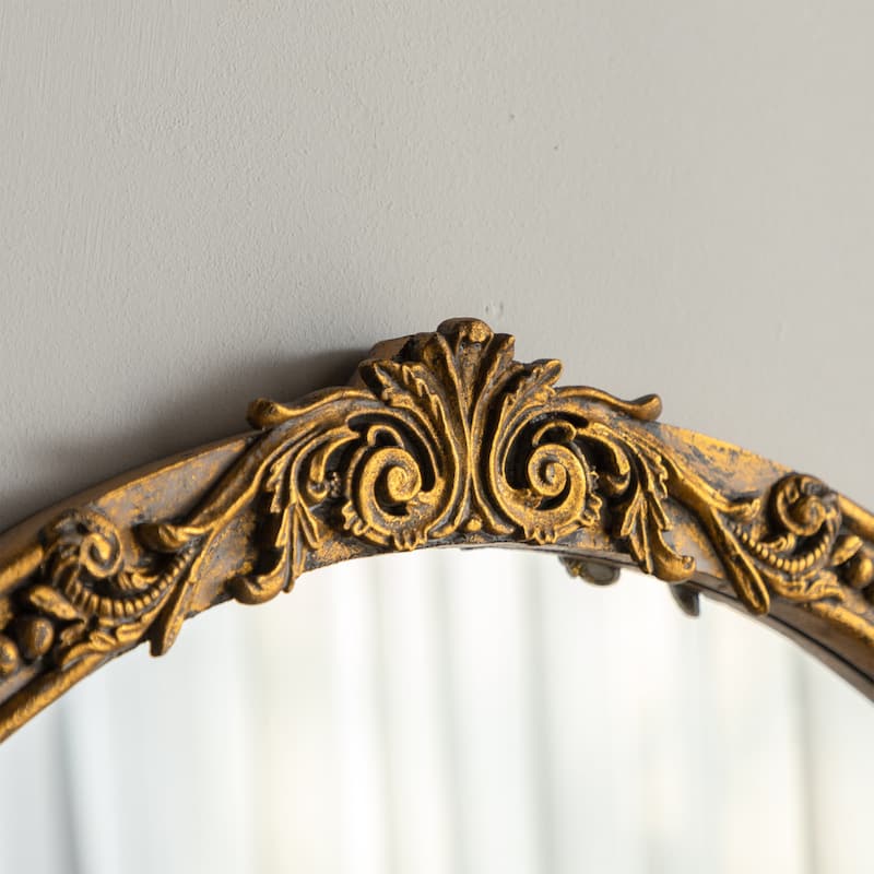 Elegant Oval Wall-mounted Decorative Mirror With Intricate Gilded Border