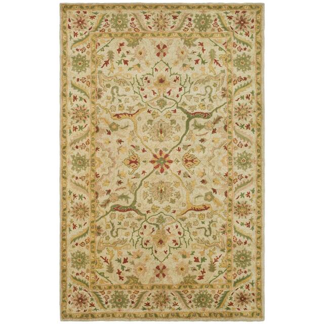 SAFAVIEH Handmade Antiquity Izora Traditional Oriental Wool Rug - 5' x 8' - Ivory