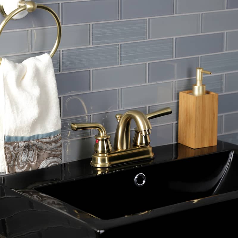 Kingston Brass Restoration Two-Handle 3-Hole Deck Mount 4" Centerset Bathroom Faucet with Plastic Pop-Up