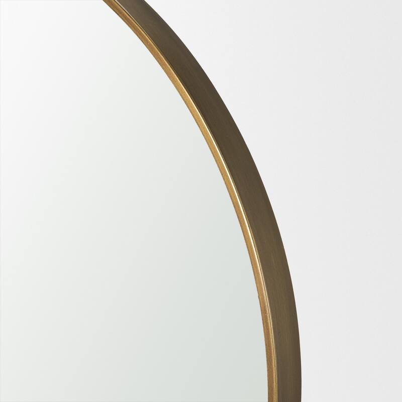 Tillie is a round mirror with a brushed gold metal frame. - 36.0L x 1.8W x 37.5H