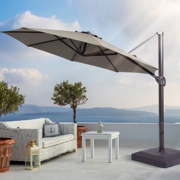 10 ft aluminum pole cantilever solar patio umbrella WestinTrends 10 ft Outdoor Patio Solar LED Cantilever Umbrella with Base Weights, Dark Green