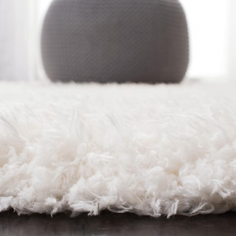 SAFAVIEH Flokati Vojsava Shag Solid Rug