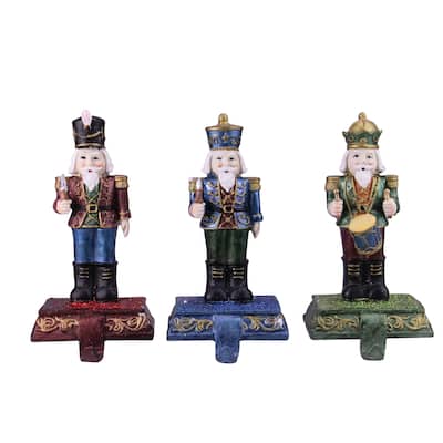 Set of 3 Blue, Red Green Glittered Nutcracker Stocking Holders 7.75"