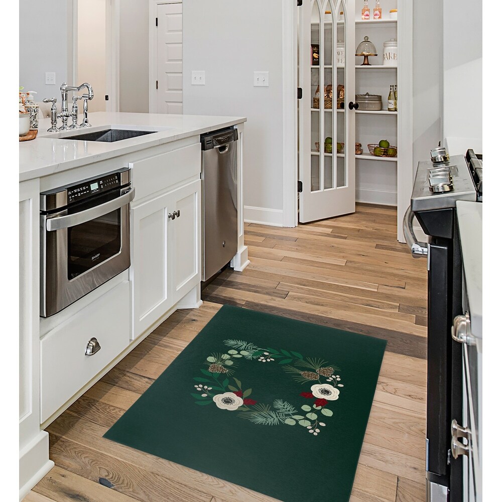 https://ak1.ostkcdn.com/images/products/is/images/direct/468474c5bc2a724c0e80376d27a156362a718760/BOTANICAL-WINTER-EVERGREEN-Kitchen-Mat-By-Kavka-Designs.jpg