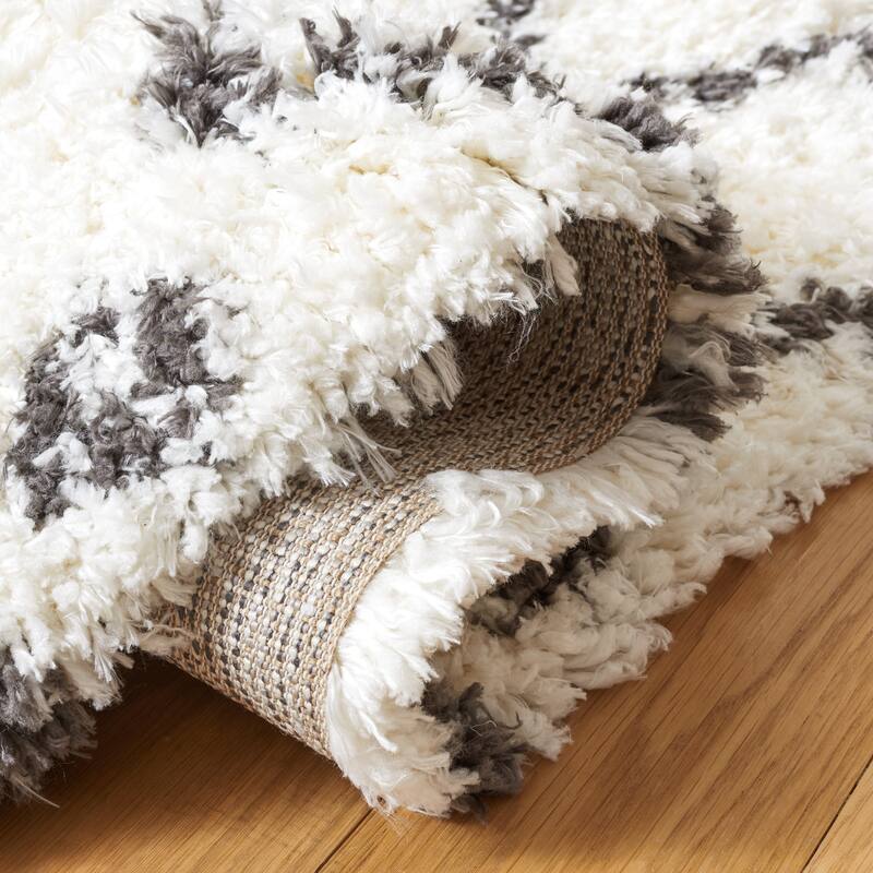 SAFAVIEH Handmade Flokati Theresie Shag Solid Polyester Rug