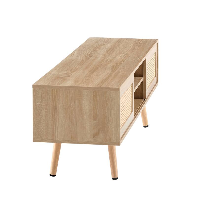 Modern Rattan Woven TV Stand with Adjustable Shelves, Solid Wood Legs, and Sliding Doors.