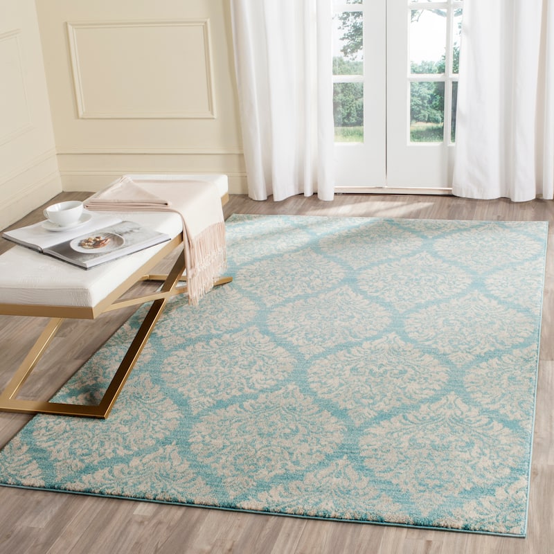 SAFAVIEH Evoke Astrea Distressed Vintage Boho Rug - 4' x 6' - Light Blue/Ivory