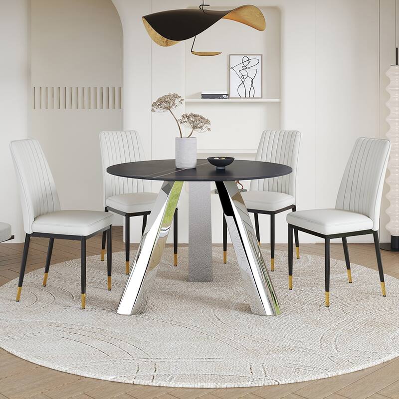 A 42-Inch Round Black Dining Table With A Granite Top And Stainless Steel Legs, Paired With Four Pu Material Dining Chairs