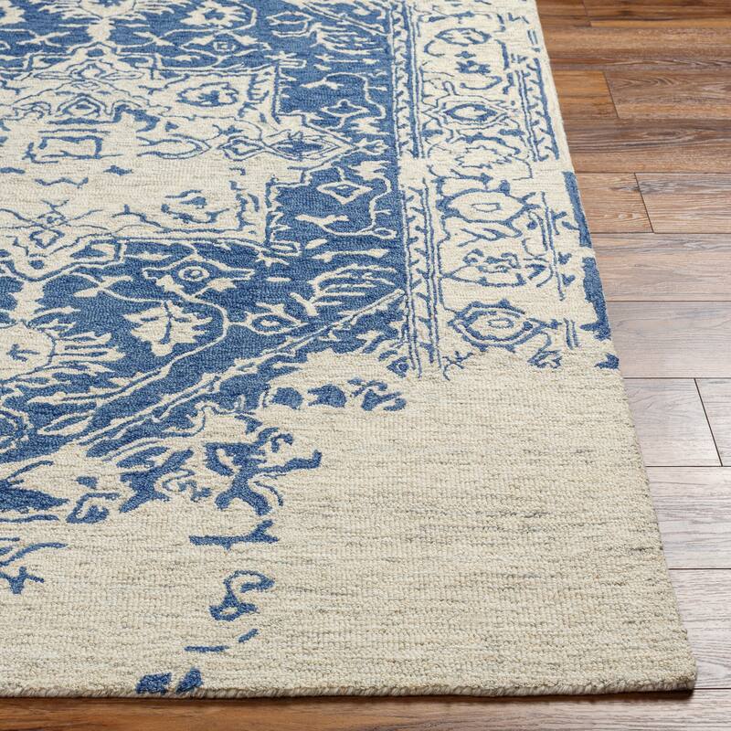 Felecia Handmade Distressed Medallion Wool Area Rug