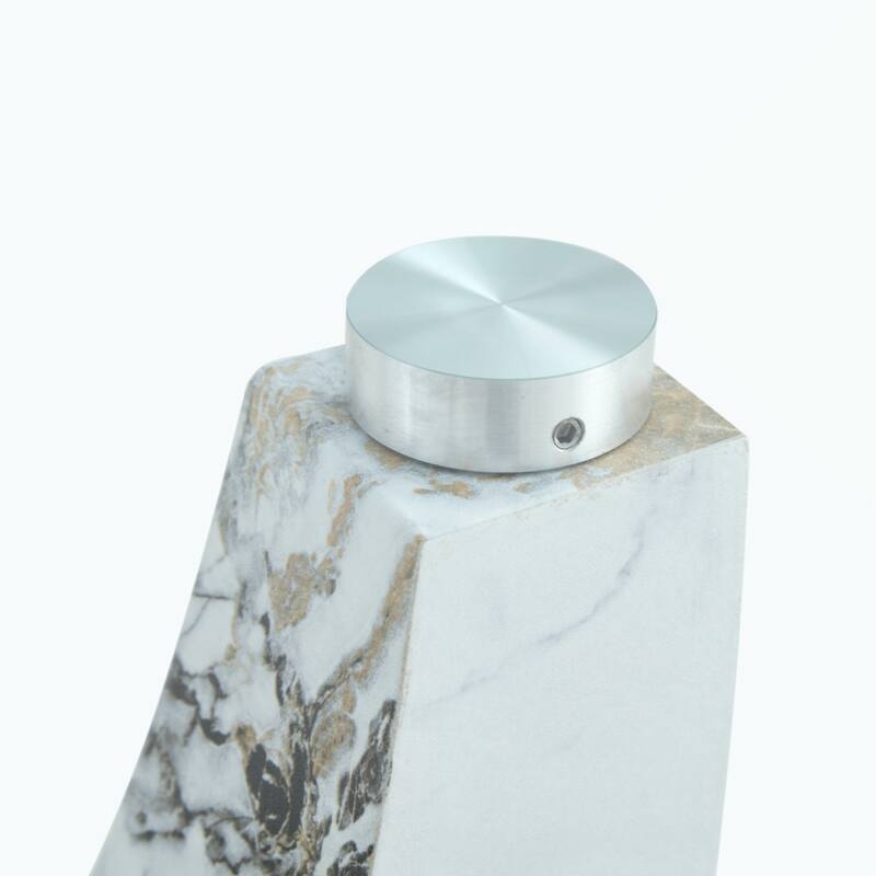 glass coffee table with marble patterned MDF legs and stainless steel decorative columns