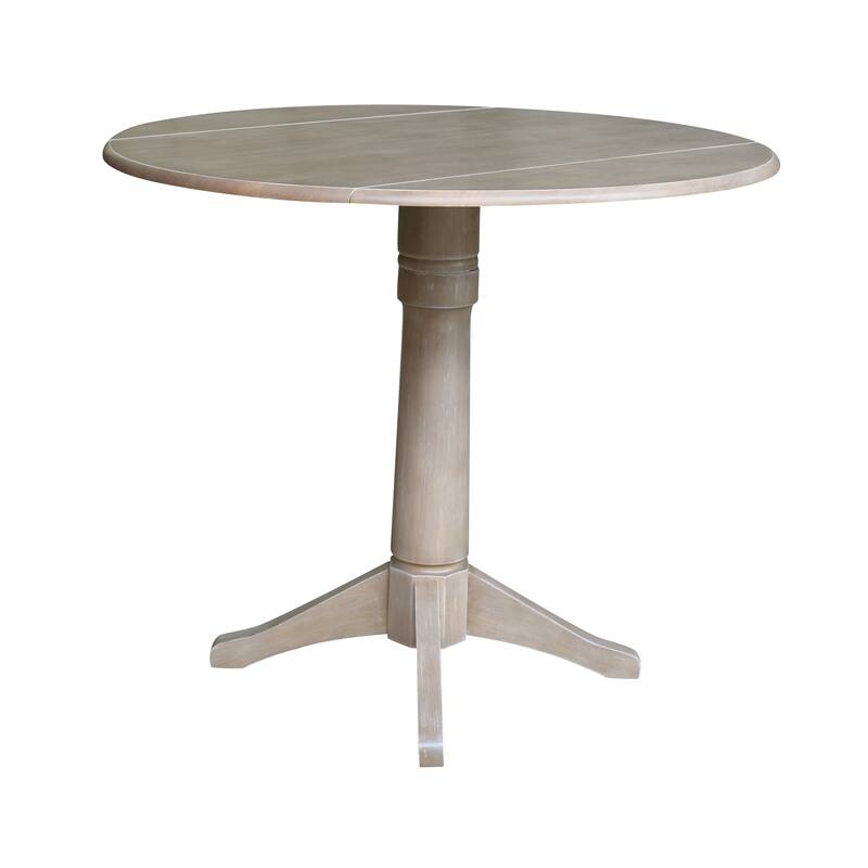 42 in. Round Top Dual Drop Leaf Pedestal Dining Table