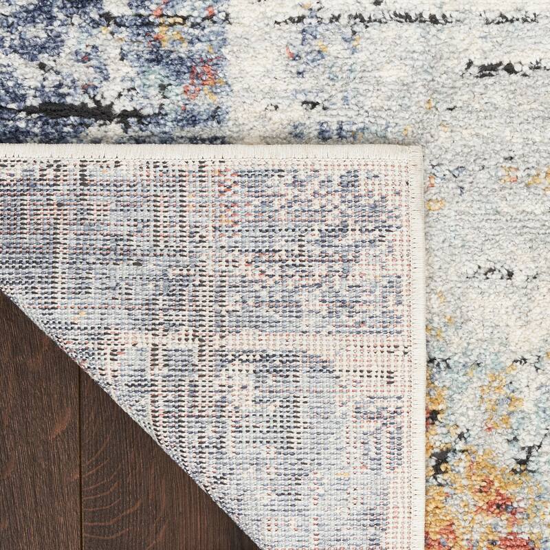 Nourison Motion Indoor only Blue Abstract Area Rug - 5' 3" x 7'