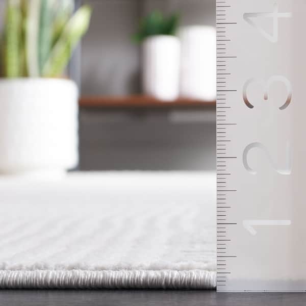 dimension image slide 1 of 2, SAFAVIEH Saylor Usha Modern Geometric Rug