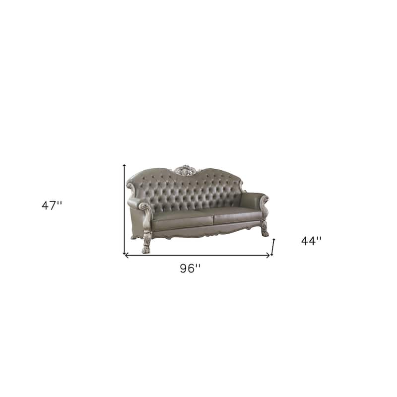 HomeRoots 96" Bone Faux Leather Sofa And Toss Pillows With White Legs - 96