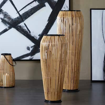 The Novogratz Brown Wicker Wood and Rattan Handmade Slatted Frame Vase with Black Metal Accents