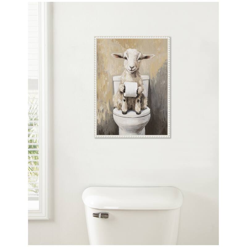 Kate and Laurel Sylvie Goat Holding Toilet Paper Roll Toilet Bathroom Art Framed Canvas by The Creative Bunch Studio