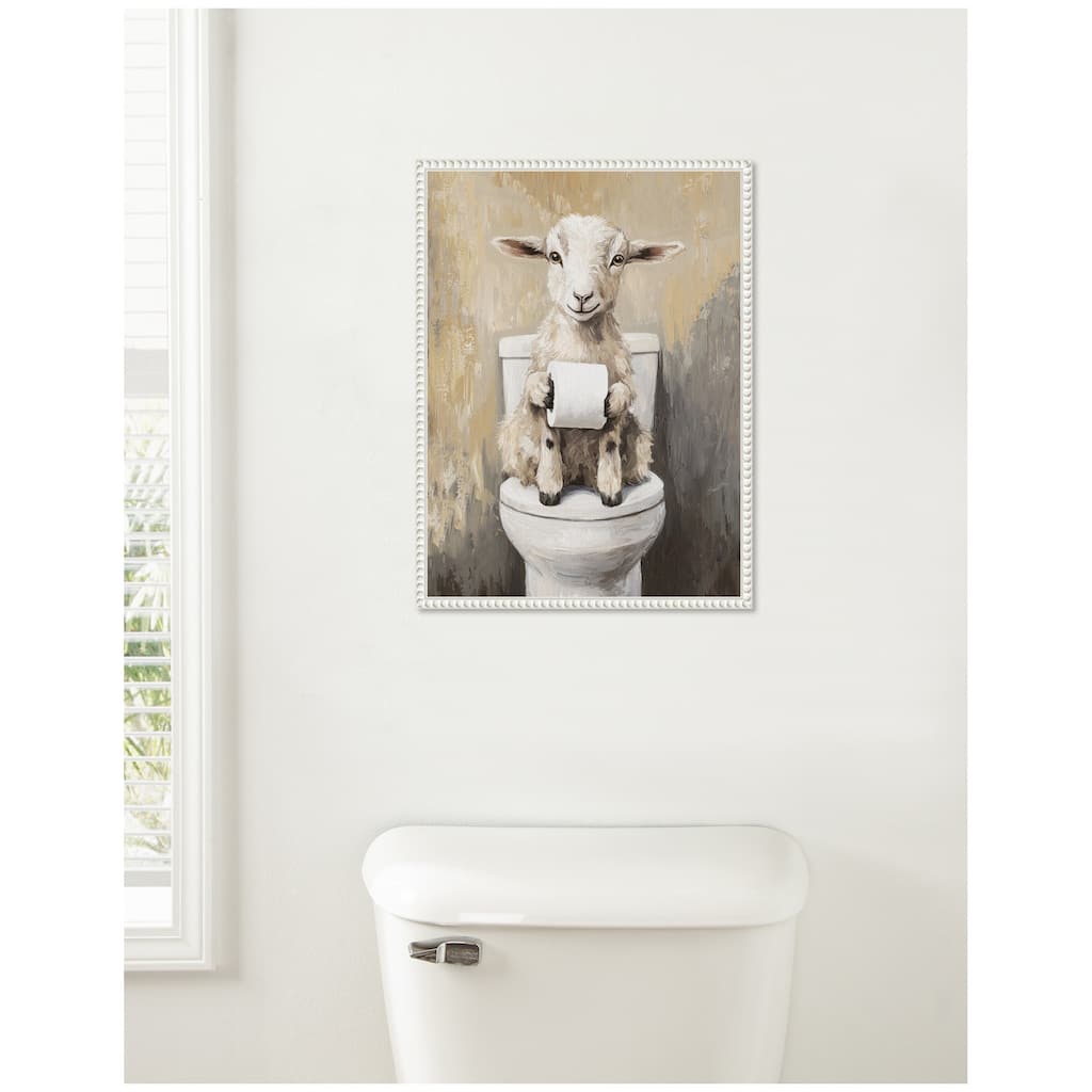 Kate and Laurel Sylvie Goat Holding Toilet Paper Roll Toilet Bathroom Art Framed Canvas by The Creative Bunch Studio