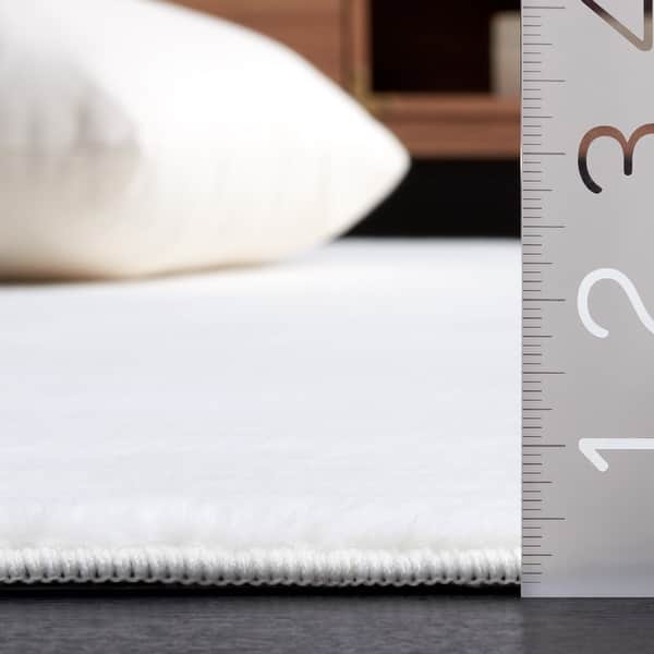 dimension image slide 1 of 9, SAFAVIEH Faux Rabbit Fur Machine Washable Slip Resistant Nanami Rug