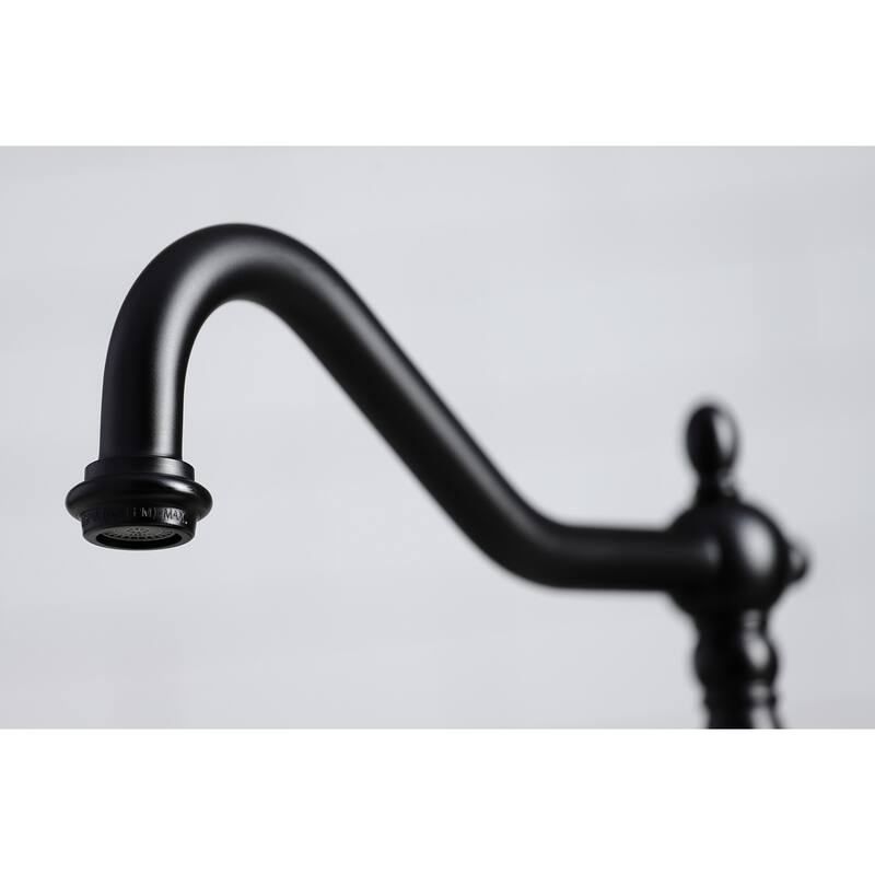 Kingston Brass Heritage Deck Mount Widespread Kitchen Faucet with Brass Sprayer
