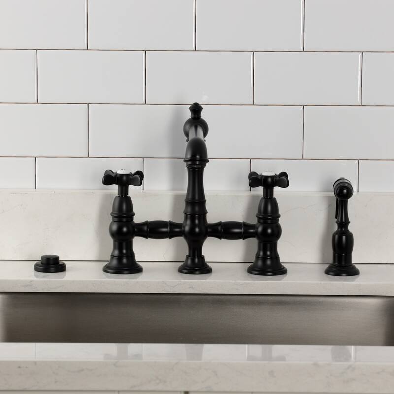 Kingston Brass Essex Two-Handle 4-Hole Deck Mount Bridge Kitchen Faucet with Brass Side Sprayer