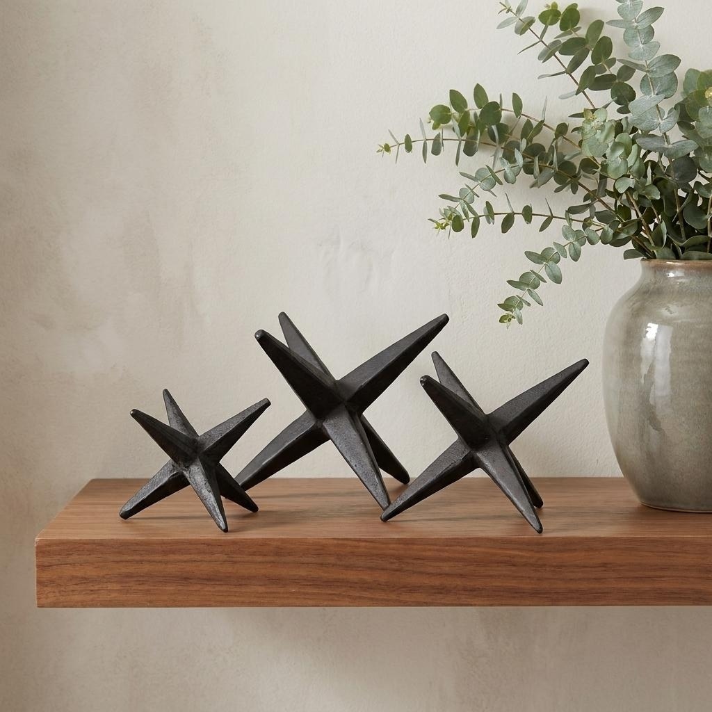 HomeRoots Set of Three Black Cast Iron Star Tabletop Sculptures - 5.00 in. x 4.00 in. x 5.00 in.
