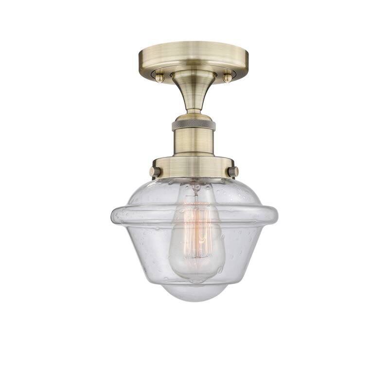 Innovations Lighting Oxford - 1 Light 7" Semi-Flush Mount - Antique Brass/Seedy