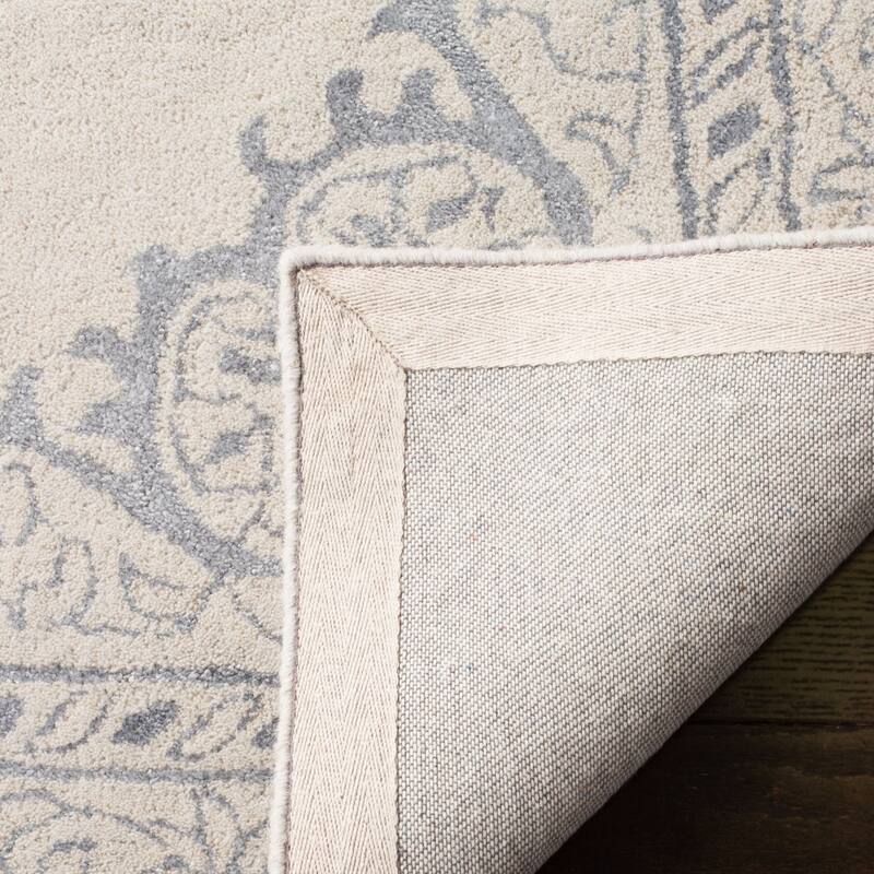 SAFAVIEH Handmade Glamour Gudmundina Modern Viscose Rug