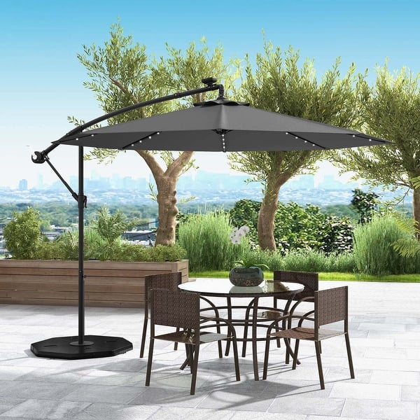 10 ft patio solar umbrella with crank and led lights Outdoor Umbrellas Cantilever 40 LED Lights, Offset Hanging Market Patio Umbrella Sunshade with Push Button Tilt for Deck, Backyard, Terrace, Party close crank Arlmont & Co. 10 Ft