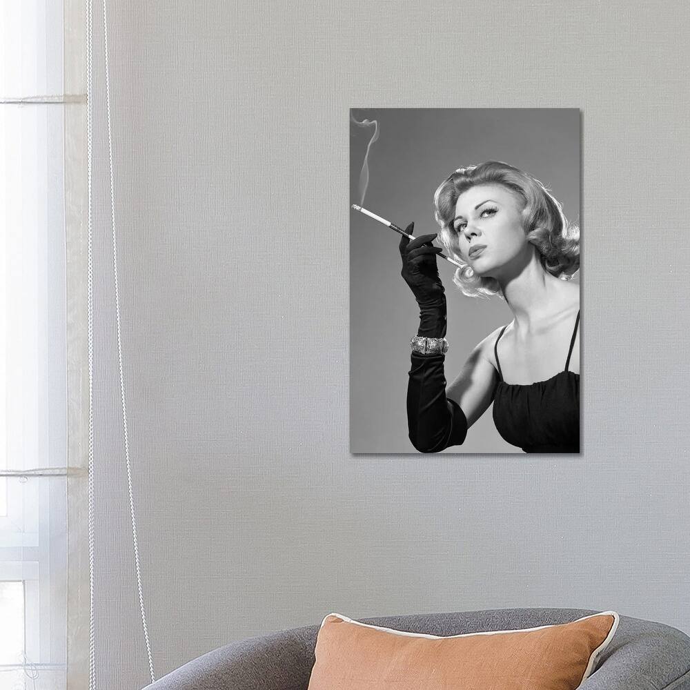 iCanvas "1960s, Woman With Long Black Gloves Smoking A Cigarette In A Long Cigarette Holder" by Vintage Images Canvas Print